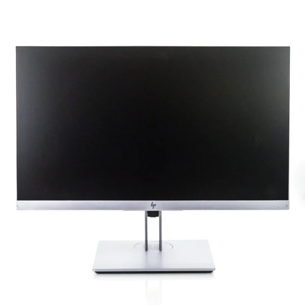 HP computer monitor on a silver stand with a black screen against a white background